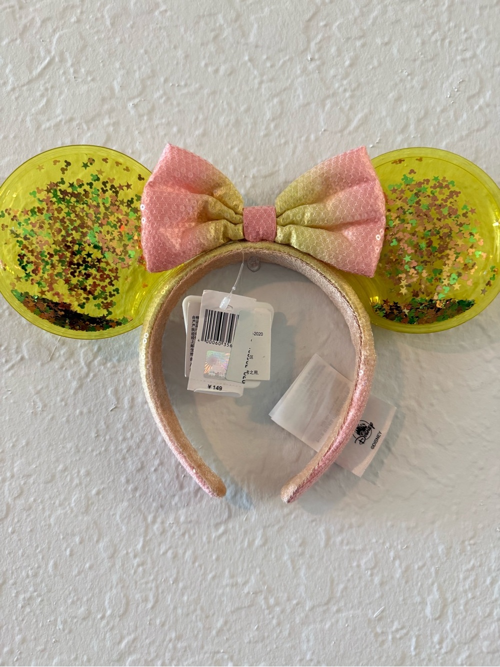 Disney Yellow Glitter Ear Headband with Pink Sequin Bow